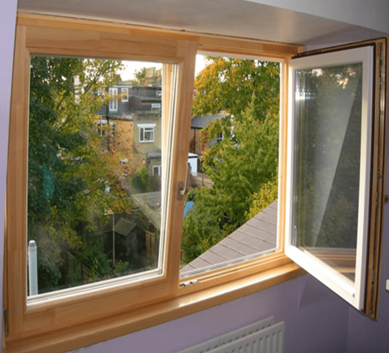 A wooden window showcasing a house and trees, designed by the smart window solution industry.